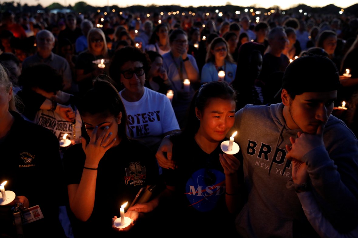 153 News - Because Censorship Kills - people-attend-a-candlelight-vigil-for-victims-of-the-shooting-at-nearby-marjory-stoneman-douglas-high-school-in-parkland-florida