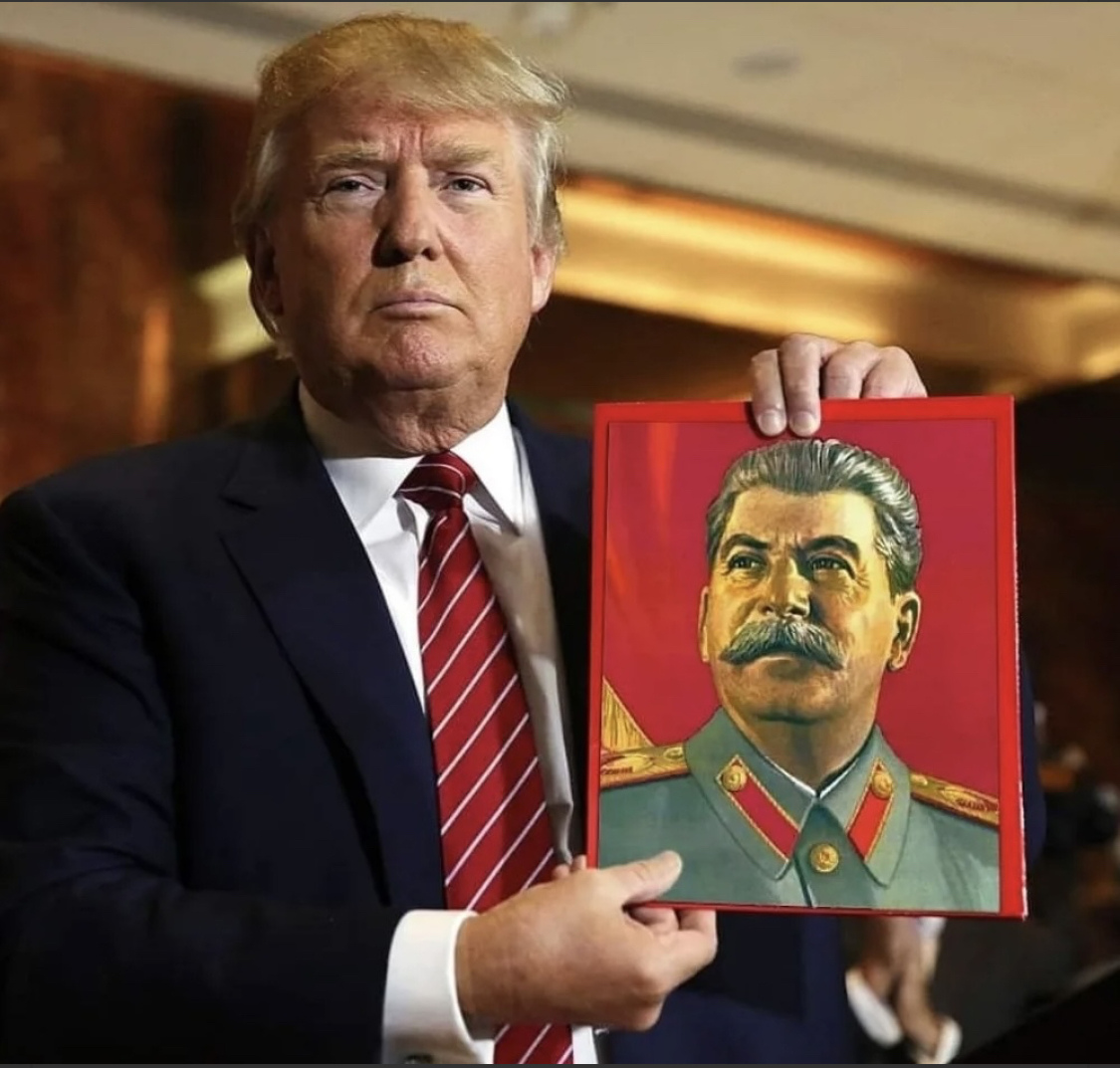 trump holding picture of stalin.jpeg