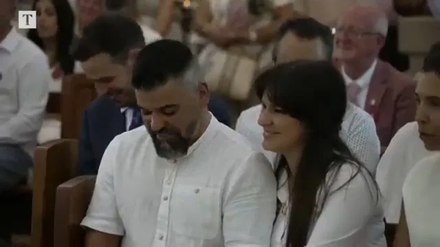 crisis actor parents smiling at funeral southport.webp