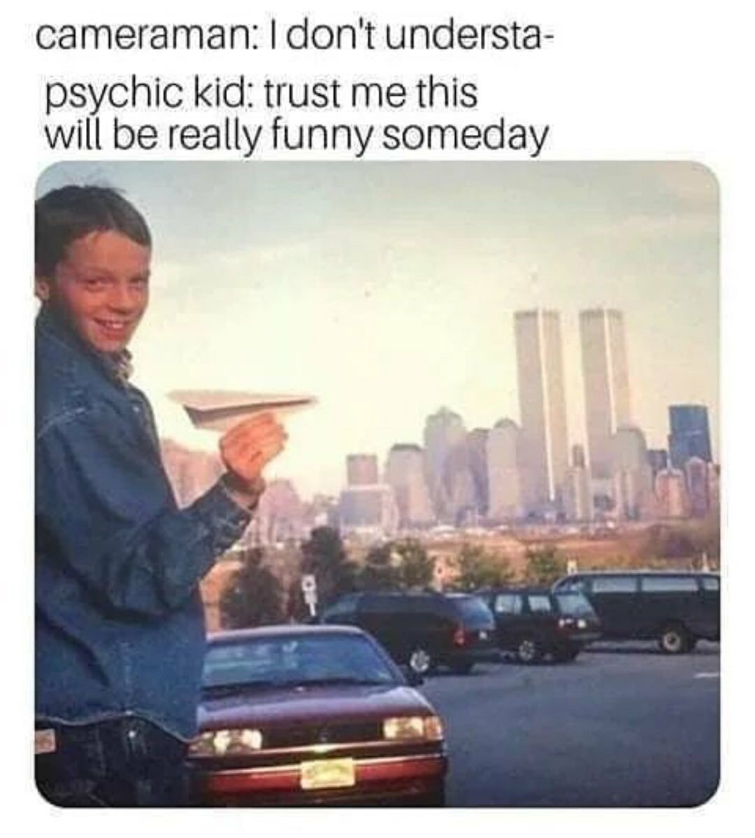 911 HUMOR PSYCHIC KID TOWERS PAPER AIRPLANE.JPG